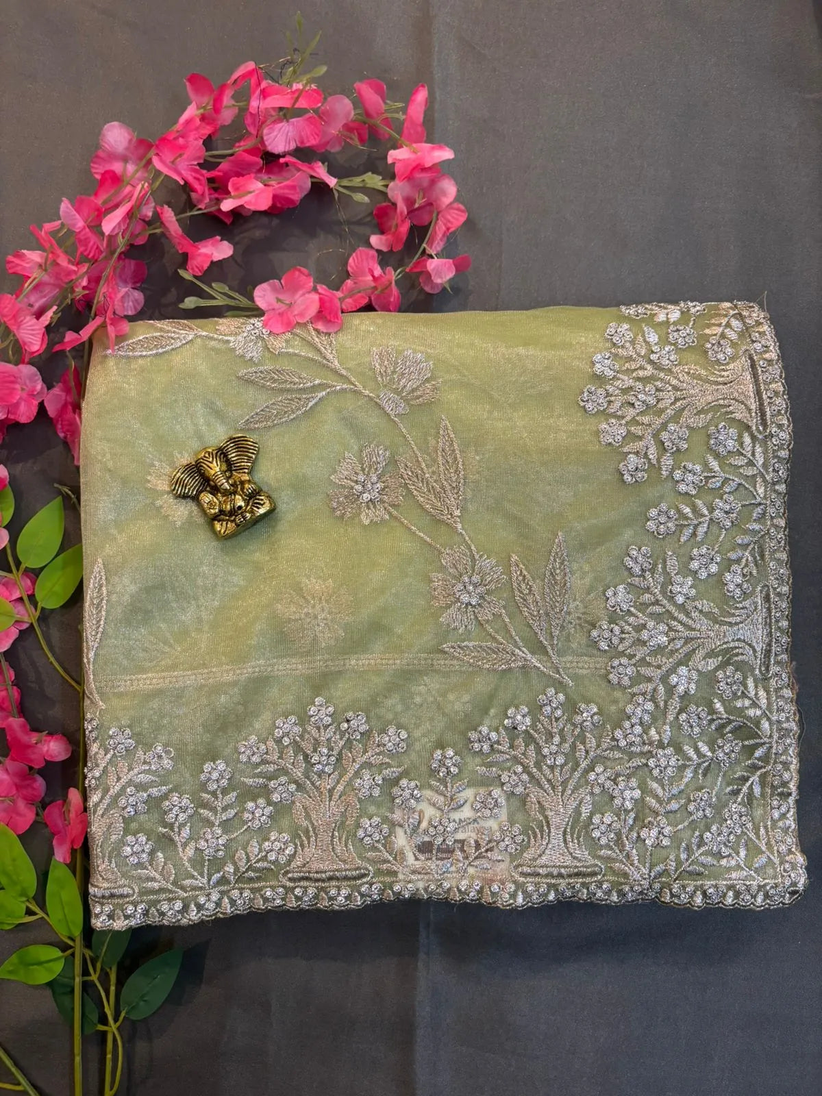 Green Net Tissue Saree with Silver Jerry Embroidery