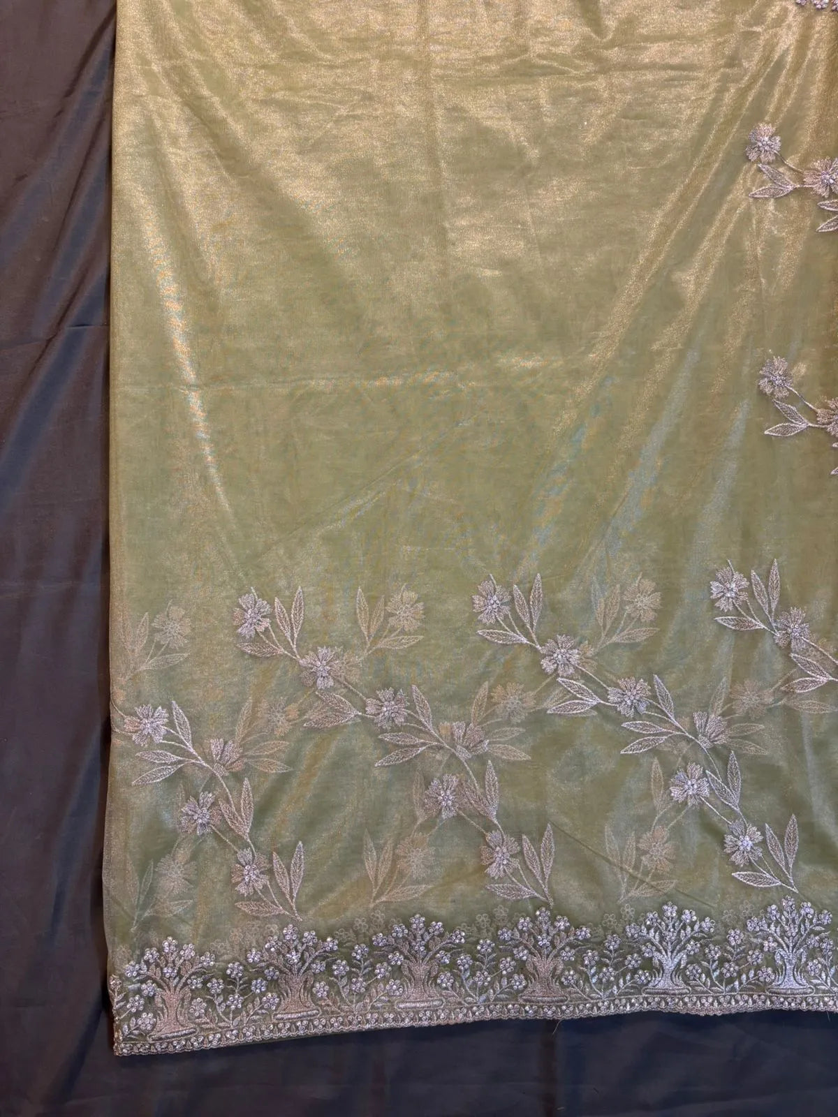Green Net Tissue Saree with Silver Jerry Embroidery