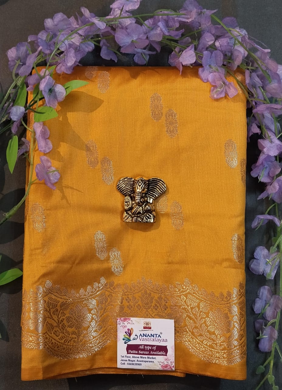 Light Orange Mushroo Silk Saree with Zari Buttas