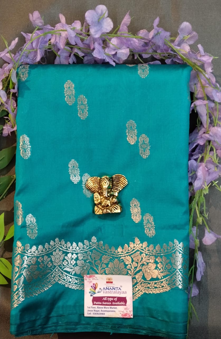 Light Orange Mushroo Silk Saree with Zari Buttas